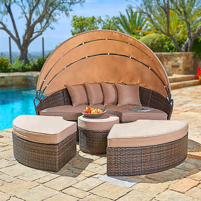 China PE rattan sunbed round lounger waterproof beach chair garden sets furniture for outdoor daybed supplier